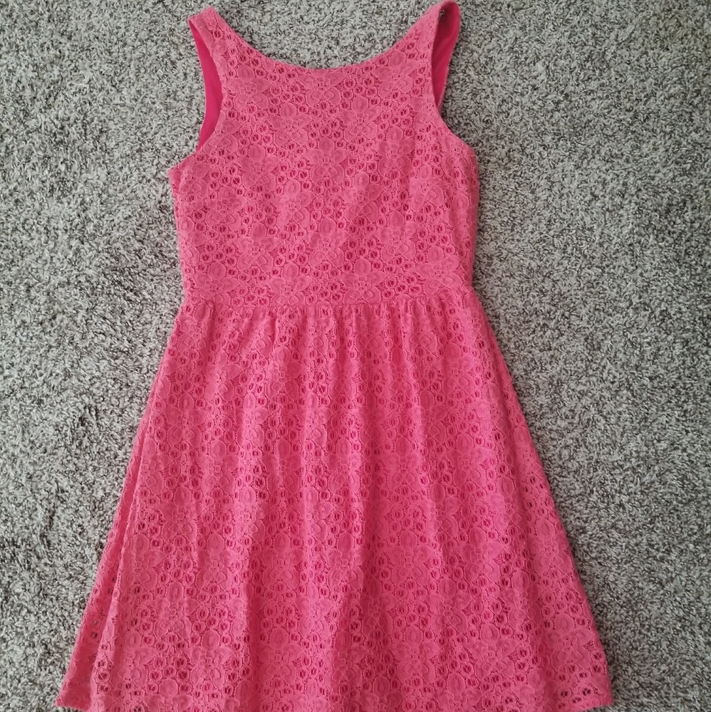 Coral lace dress with scoop back and exposed zip